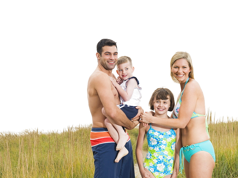 Portrait of family in bathing suits