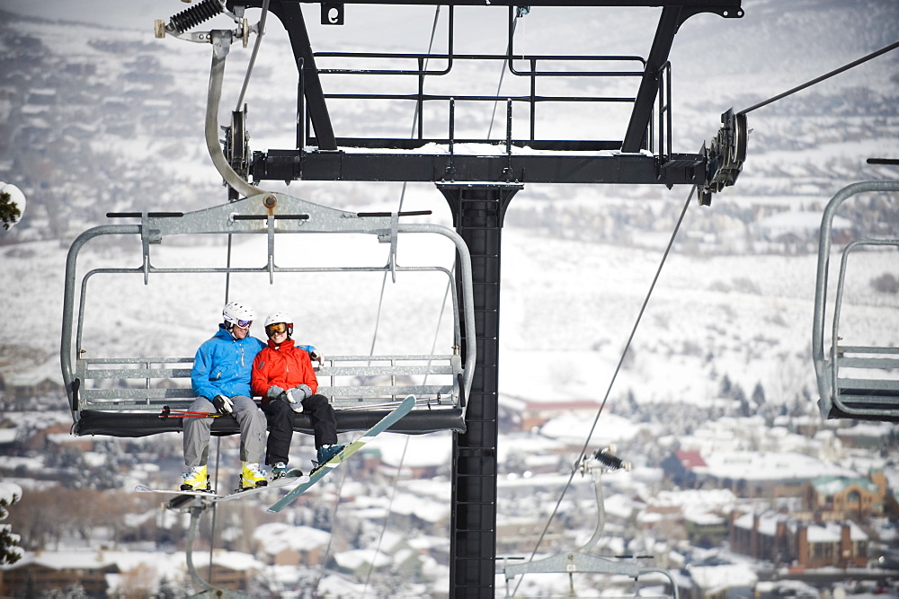 Skiers on a ski lift