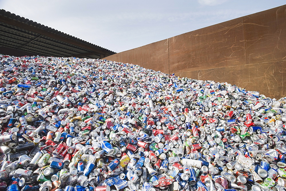 Pile of aluminum cans at recycling plant