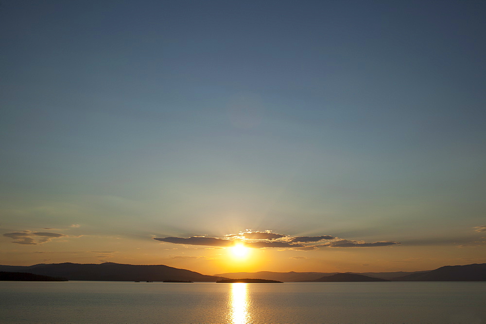 USA, Montana, Flathead Lake, View of sunset over lake, USA, Montana, Flathead Lake