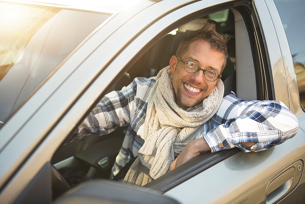 Portrait of smiling car owner
