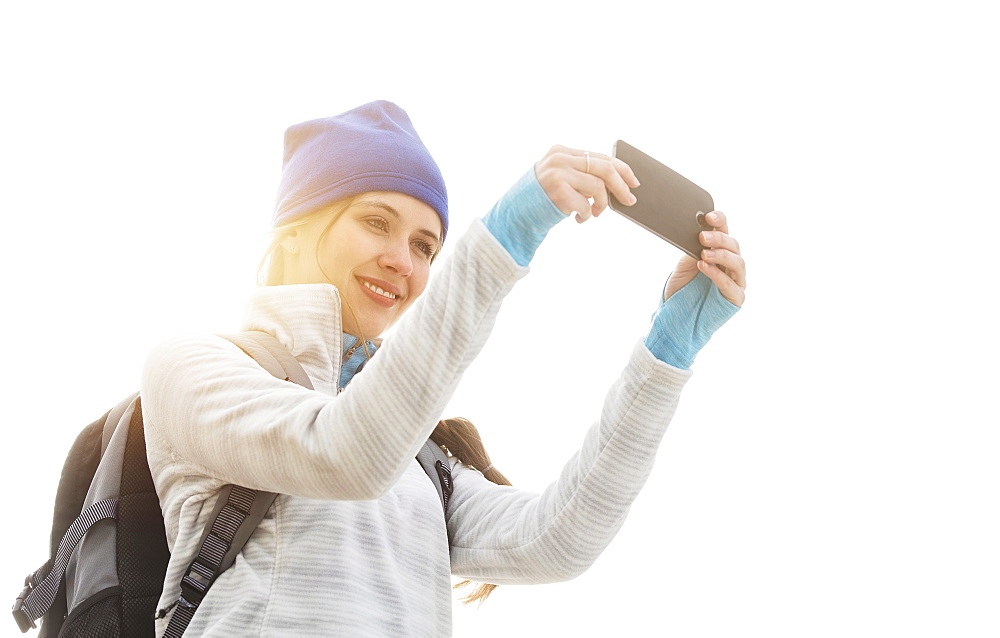 Female tourist taking selfie