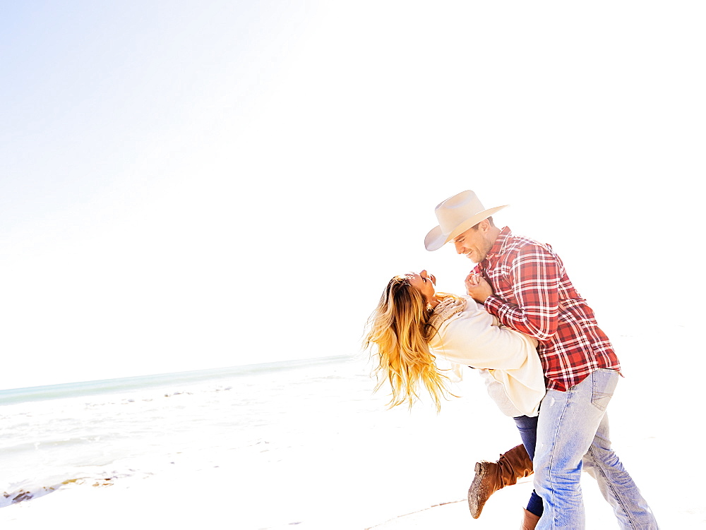 Loving couple on beach, Jupiter, Florida