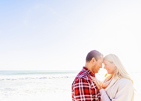 Smiling couple on beach, Jupiter, Florida