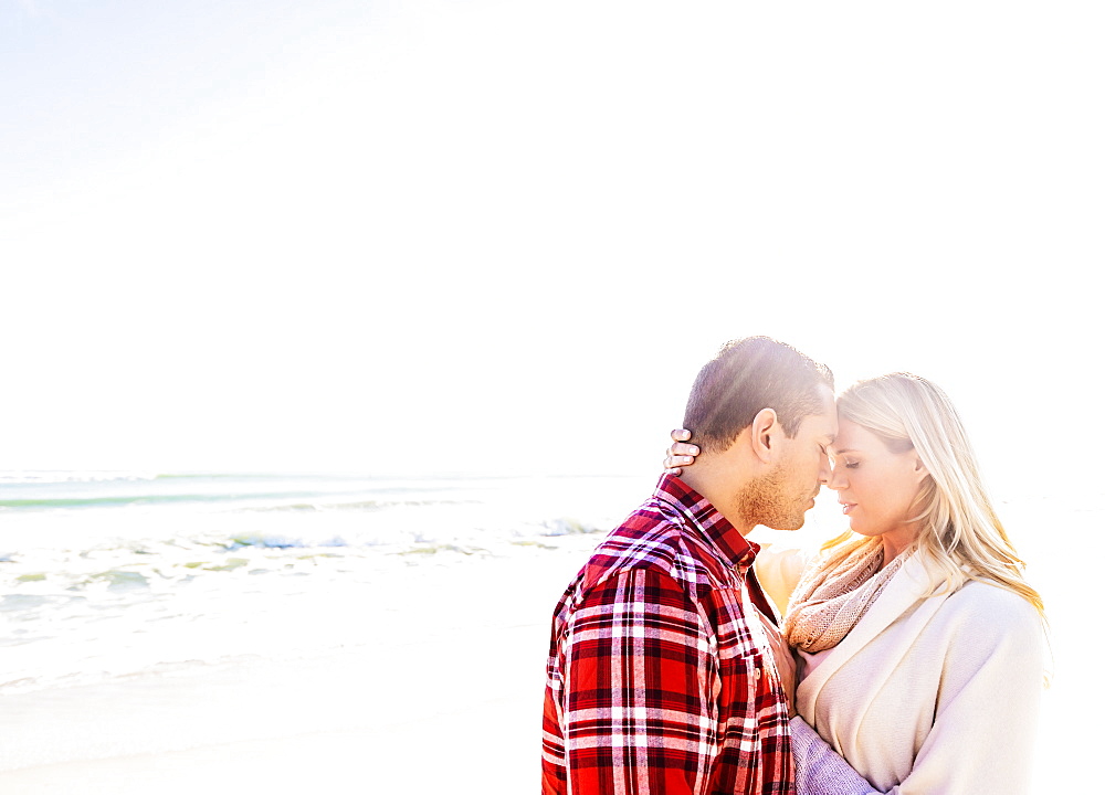 Loving couple on beach, Jupiter, Florida