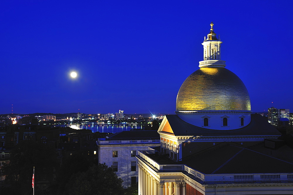 Massachusetts State House Dome and city skyline at dusk, Boston, Massachusetts