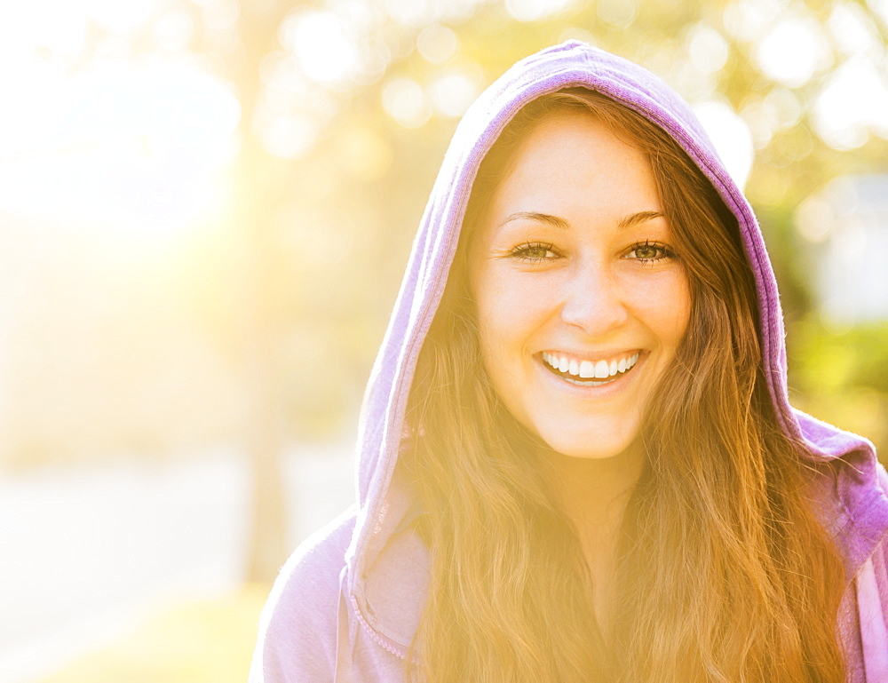 Portrait of smiling woman in hoodie, Jupiter, Florida