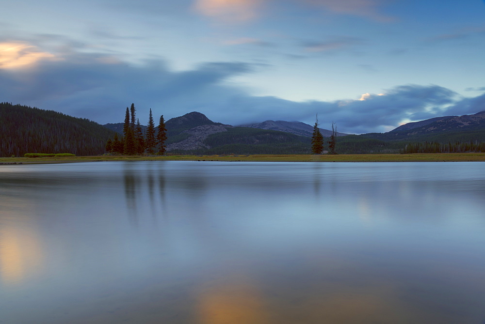 Scenic view of lake and hills at dawn, Sparks Lake, Oregon