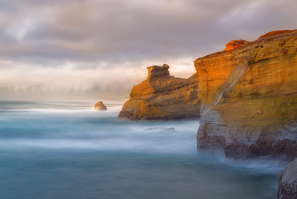 Scenic view of cliffs along coastline, Cape Kiwanda, Oregon