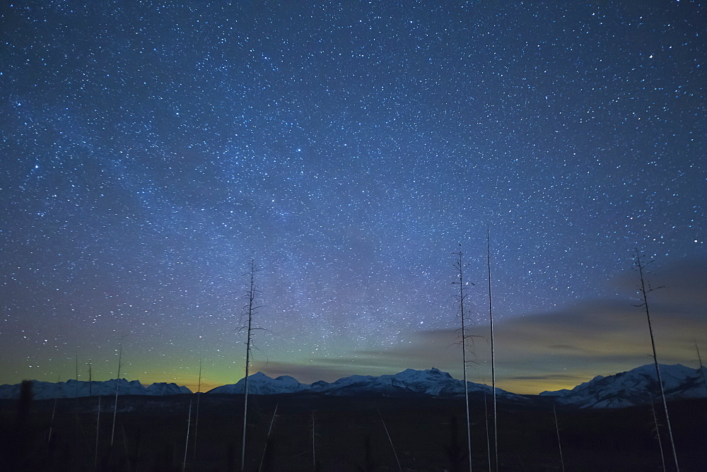 Scenic view of night sky with aurora borealis, Glacier National Park, Montana, USA