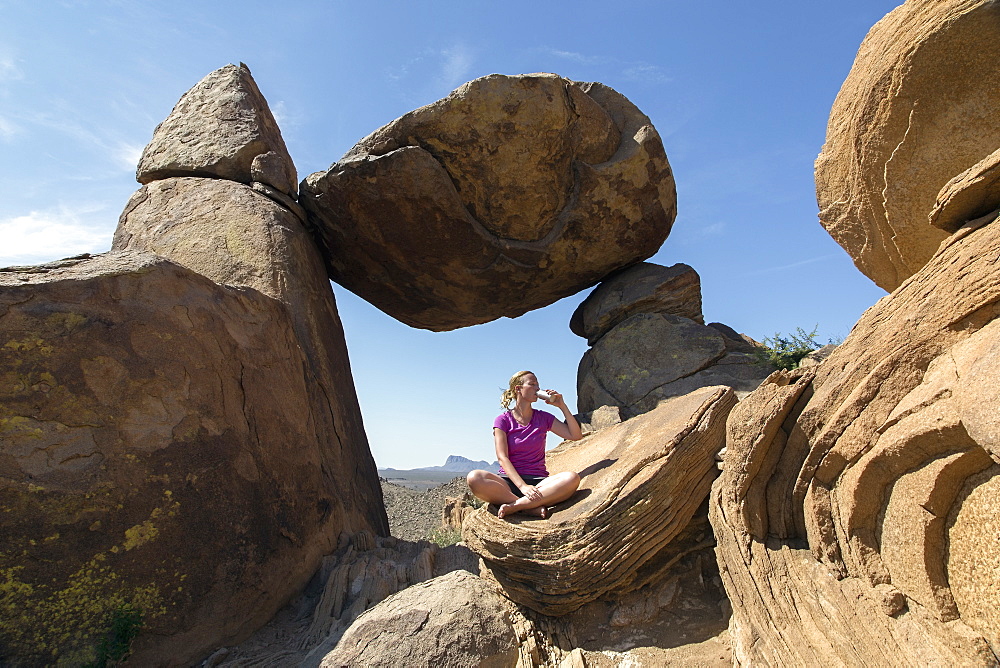 Woman visiting Balanced Rock, Balanced Rock Big Bend National Park Grapevine Hills, Texas 