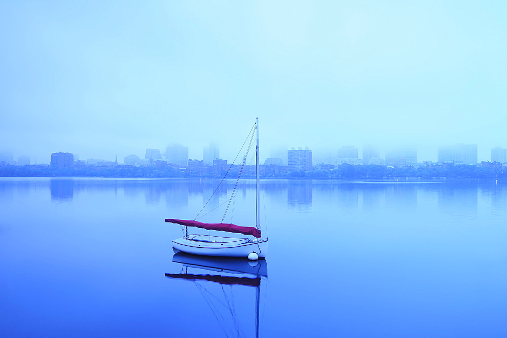 Charles River with boat shrouded in fog, Charles River, Boston, Massashusetts,USA