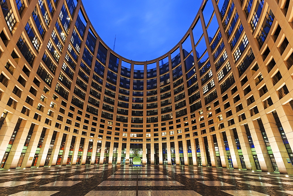 European Parliament building illuminated at dusk, European Parliament, Strasbourg, Alsace, France