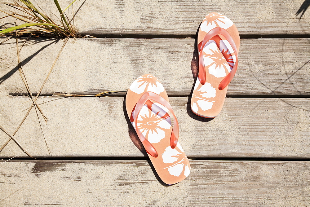 Flip flops on pier