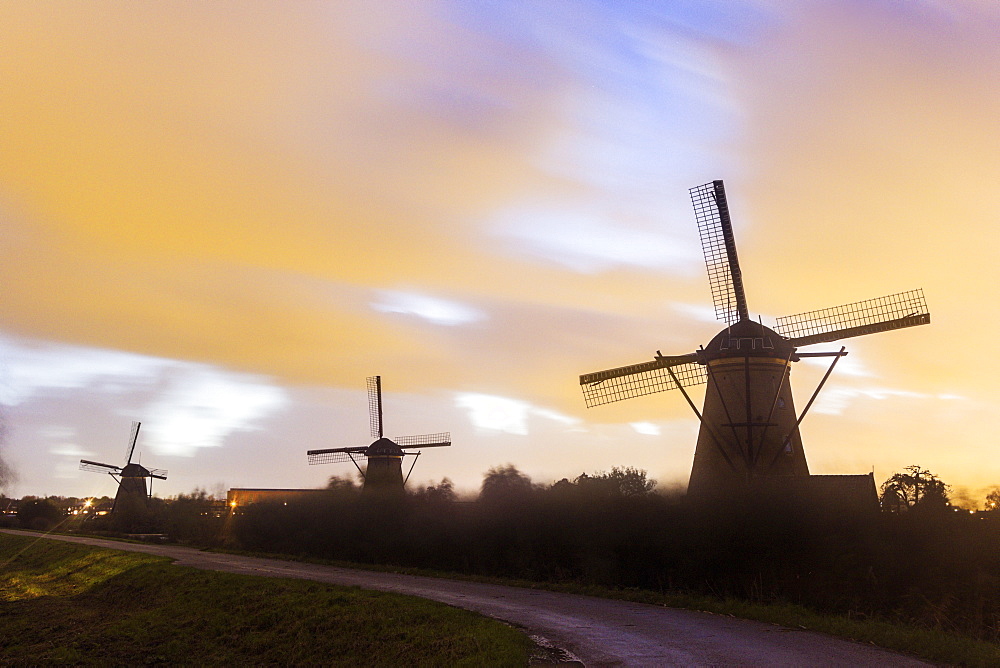 Traditional windmills at sunset, Netherlands, South Holland, Kinderdijk