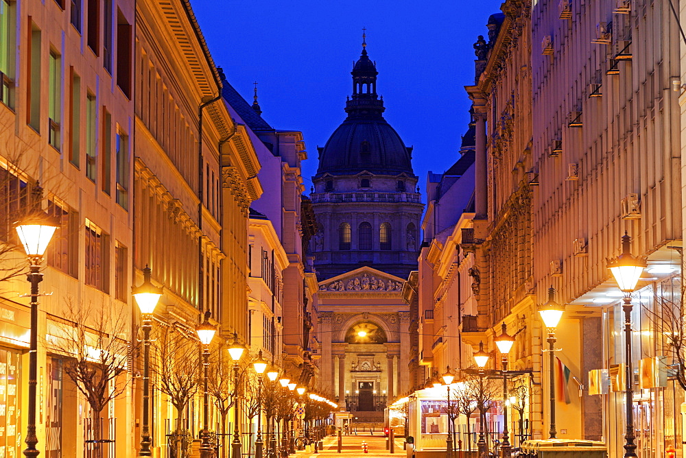 View along illuminated Zrinyi street, Hungary, Budapest, Saint Stephen's Basilica