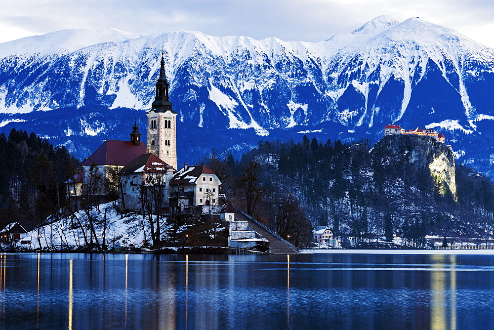 View of Church of the Assumption with lake and mountain, Slovenia, Bled, Church of the Assumption, Bled Castle