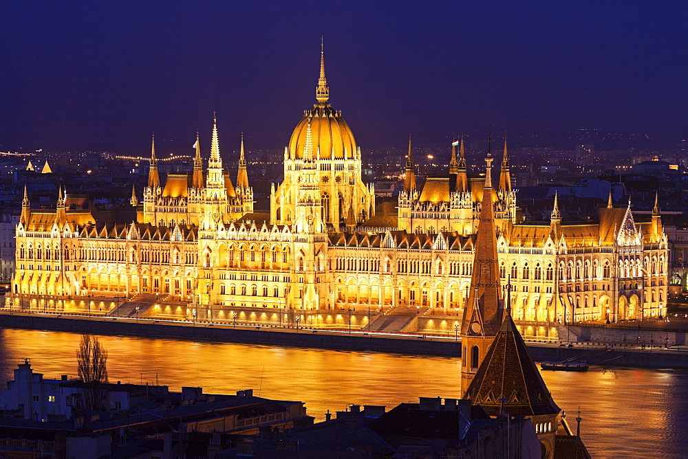 Hungarian Parliament illuminated at night, Hungary, Budapest, Hungarian Parliament,Protestant church, Fisherman's Bastion