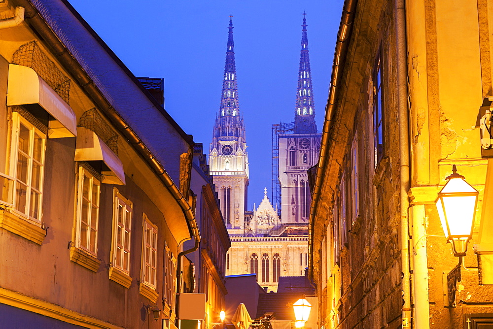 Illuminated street and spires of Zagreb Cathedral, Croatia, Zagreb, Zagreb Cathedral