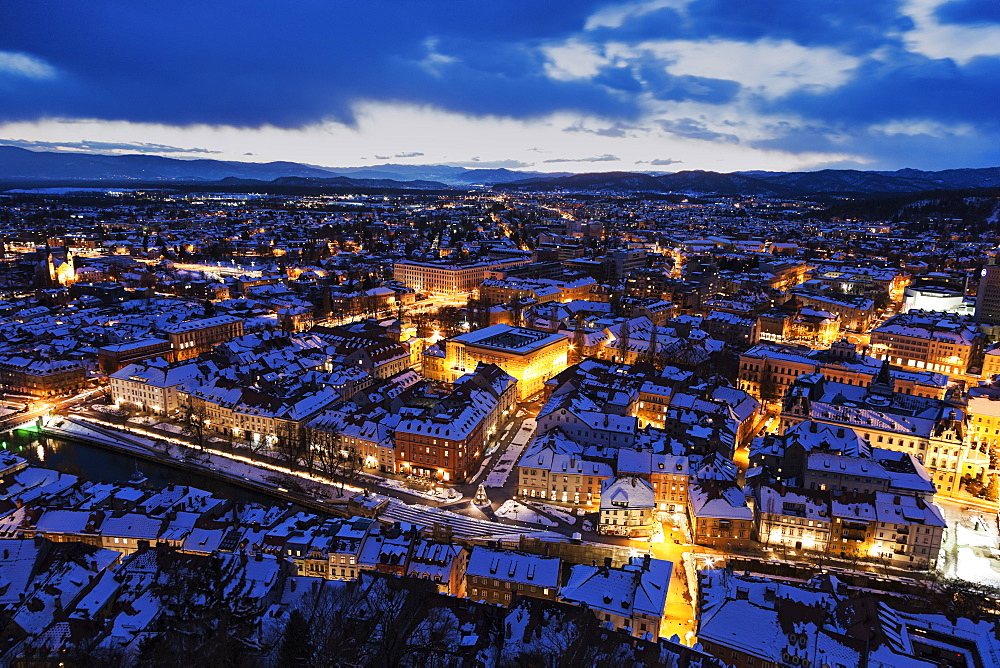 Illuminated cityscape at dusk, Slovenia, Ljubljana