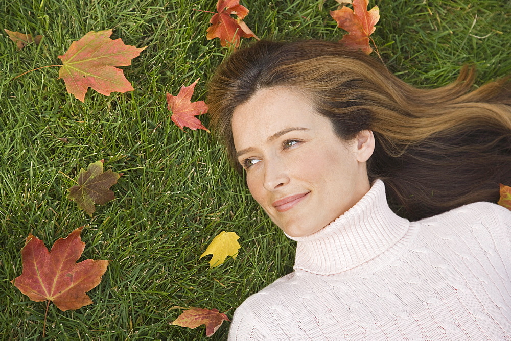 Woman laying in grass