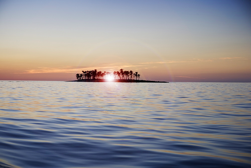Sunset over tropical island