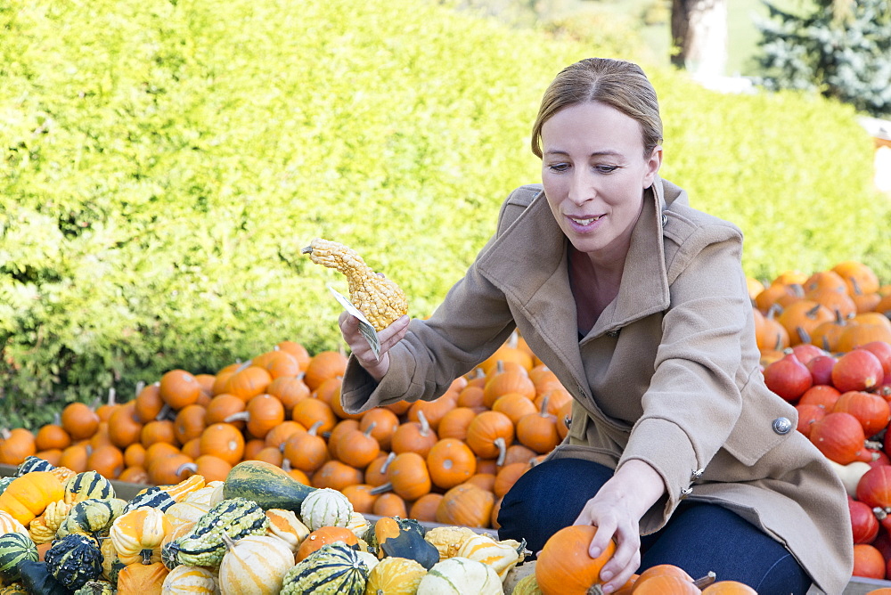 Austria, Salzburger land, Maria Alm, Mature woman amongst vegetables