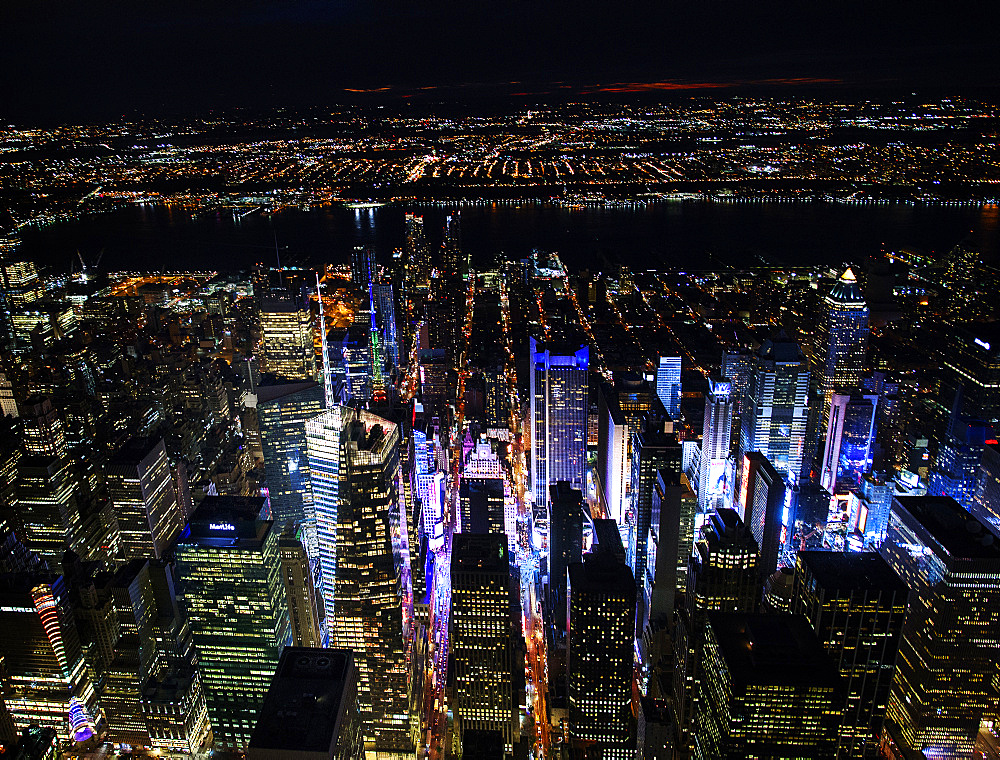 USA, New York, New York City, Manhattan, Aerial view of illuminated skyline with Times Square at night