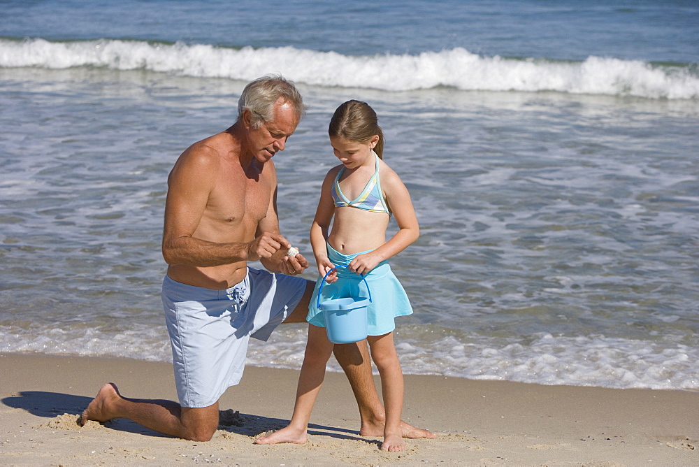 Father and daughter at beach