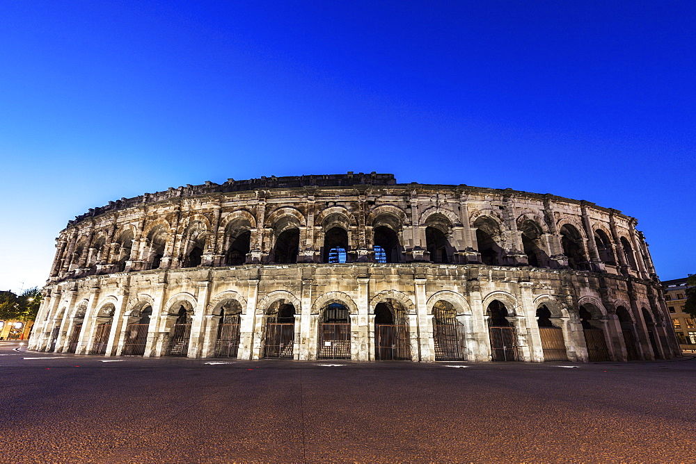 France, Occitanie, Nimes, Arena of Nimes at dusk