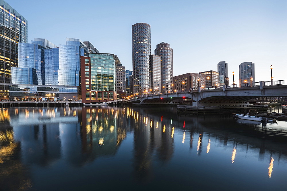 USA, Massachusetts, Boston, Fort Point Channel, Waterfront of financial district at dawn