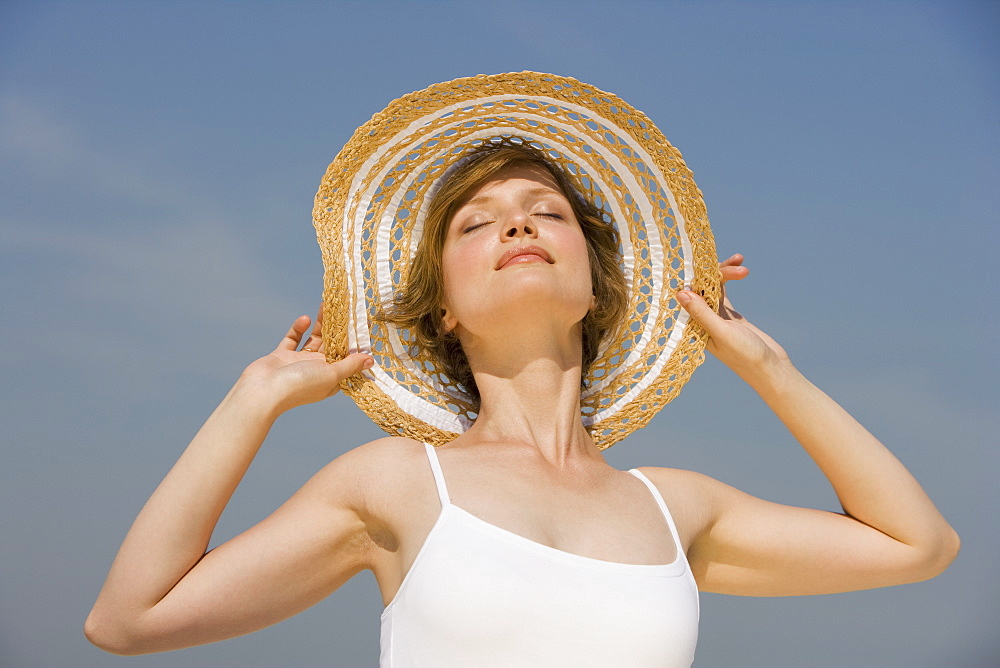 Woman wearing sunhat