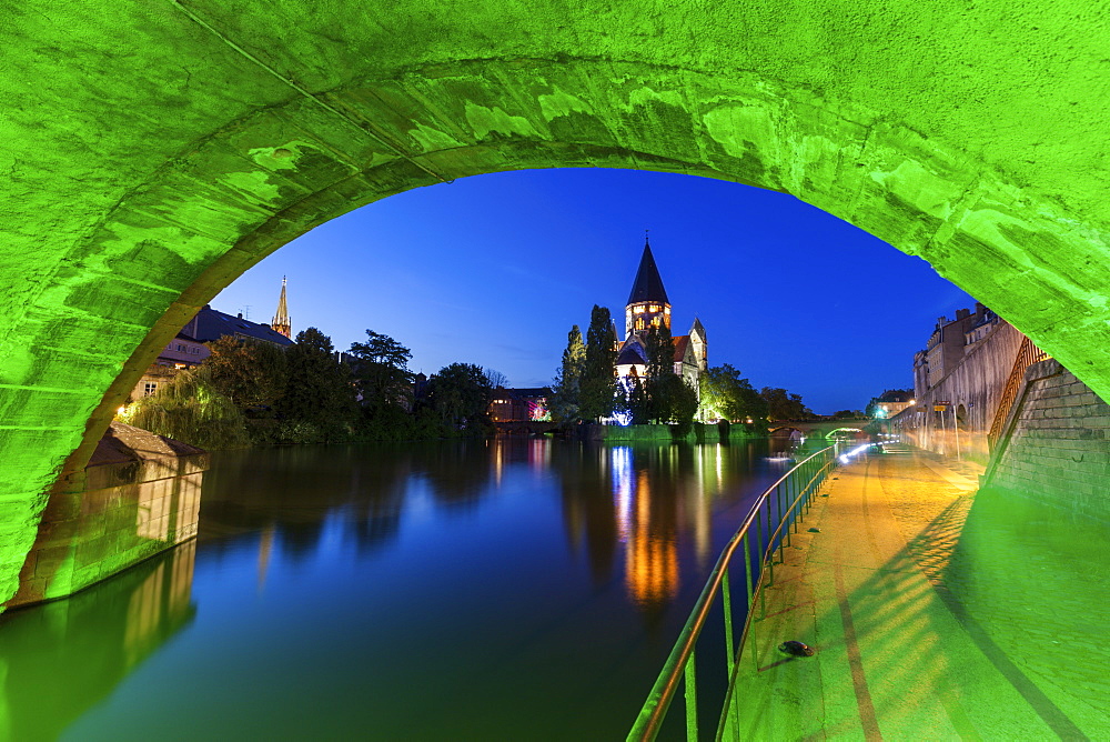 Temple Neuf and illuminated bridge in Metz, France