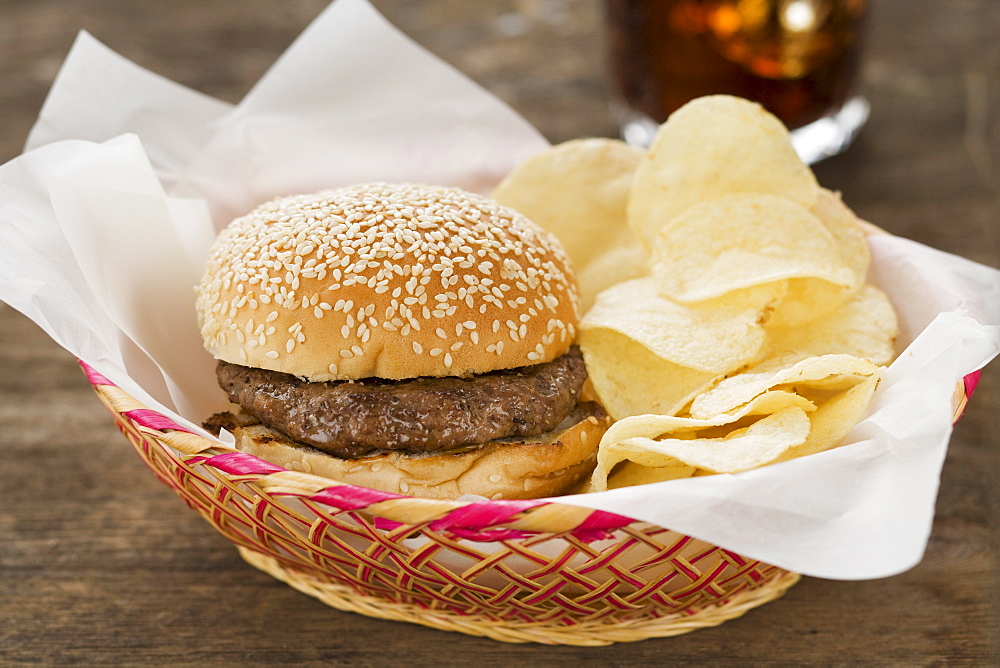 Hamburger and chips in basket