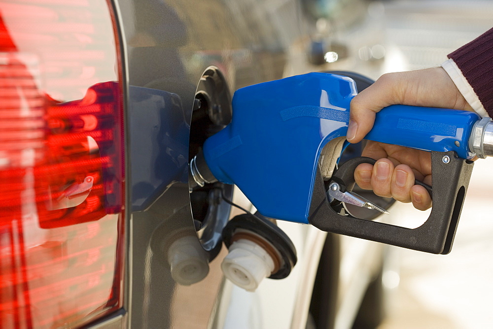 Man pumping gas