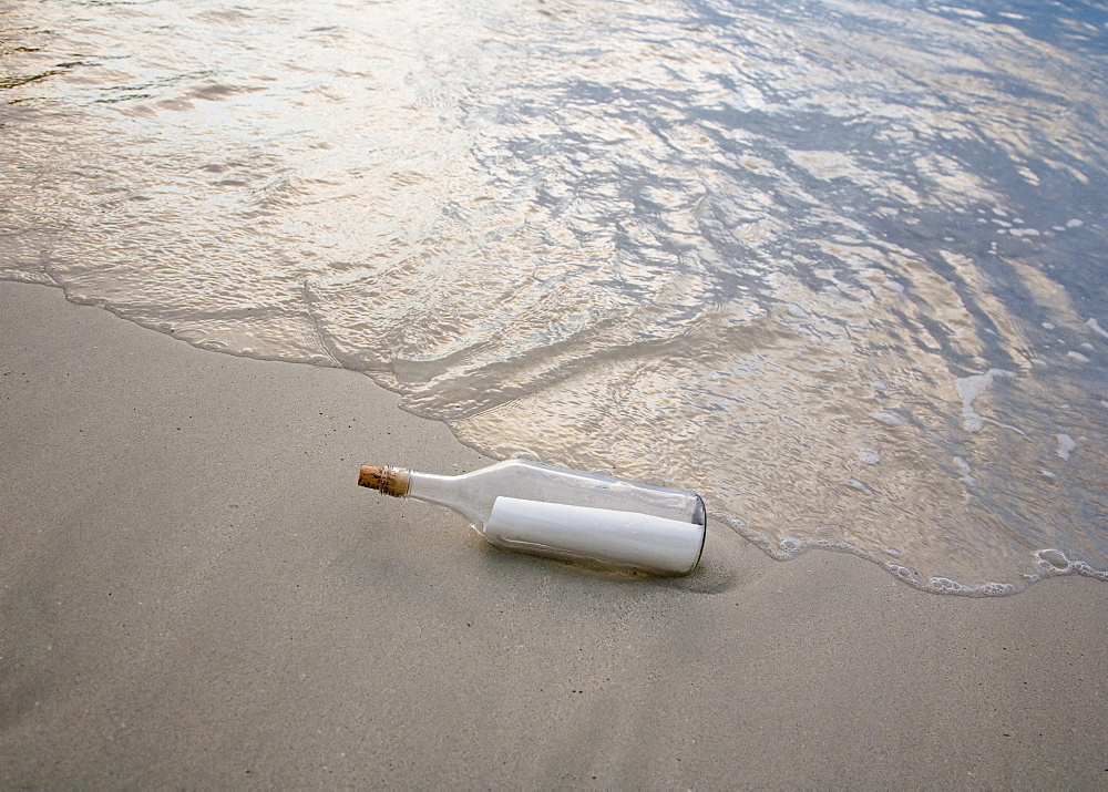 Message in bottle on beach