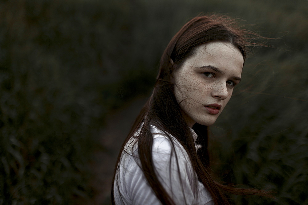 Portrait of windswept teenage girl