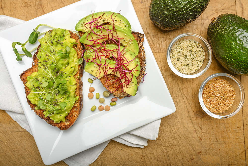 Avocado and bean sprouts on toast