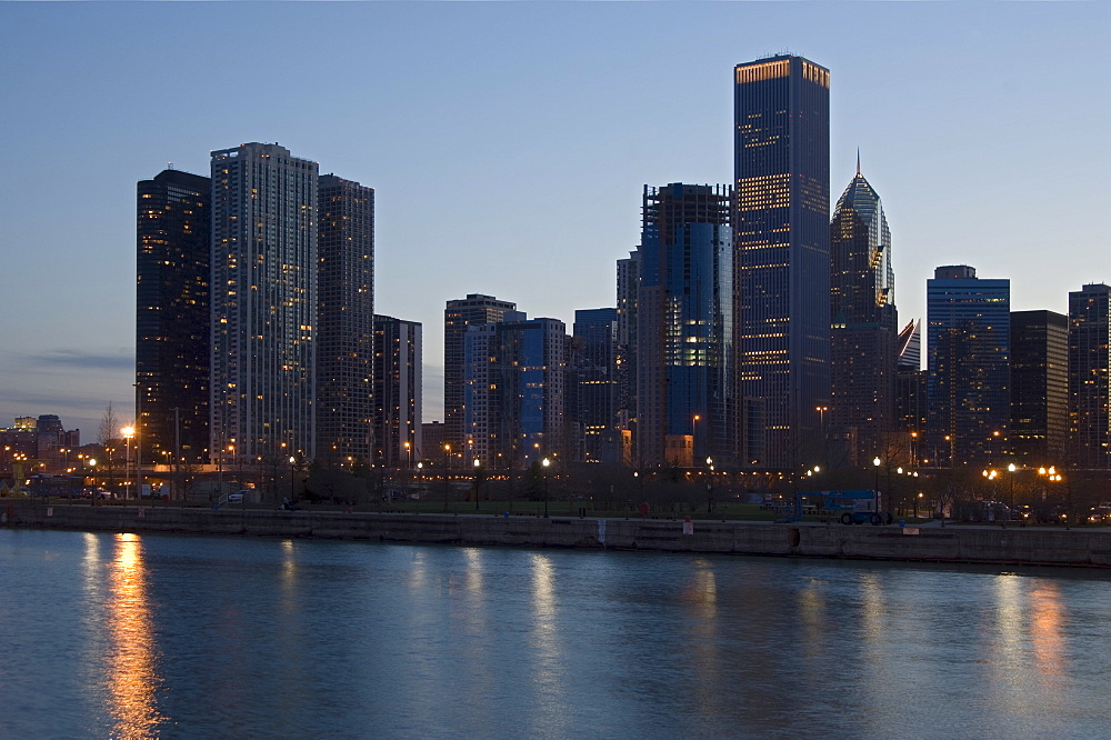 Skyline at night with Lake Michigan Chicago Illinois USA