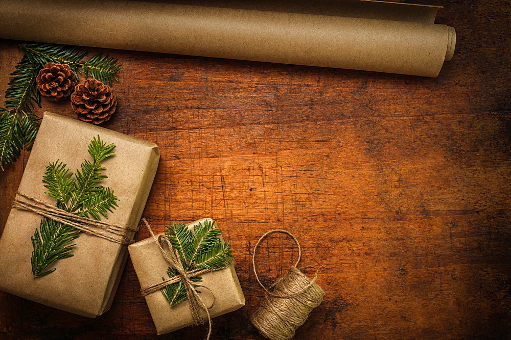 Pine fronds tied to Christmas presents