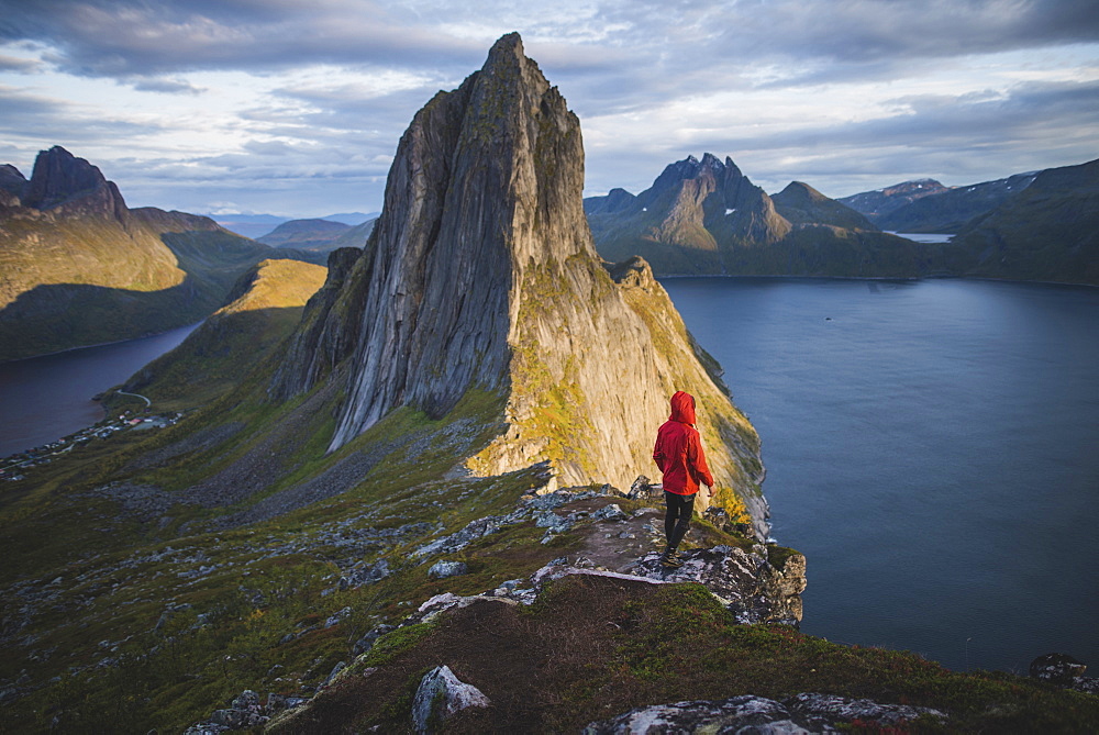 Norway, Senja, Man standing near Segla mountain