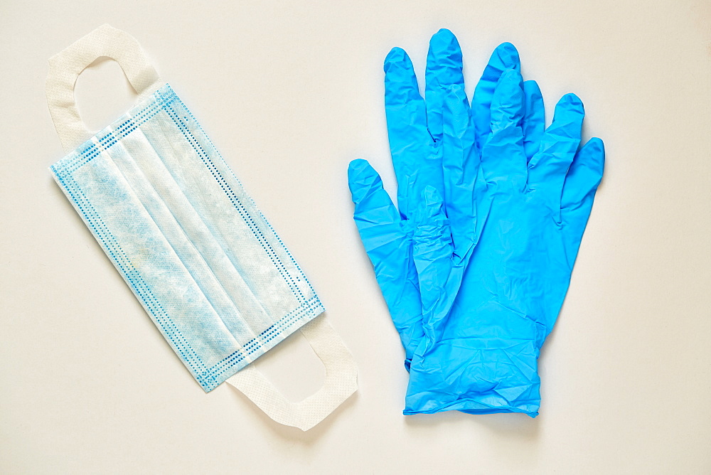 Studio shot of surgical mask and latex gloves