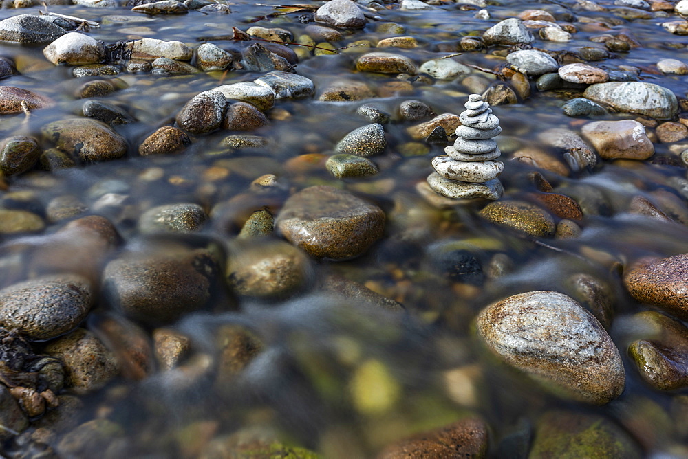 USA, Idaho, Sun Valley, Rock stack among river rocks