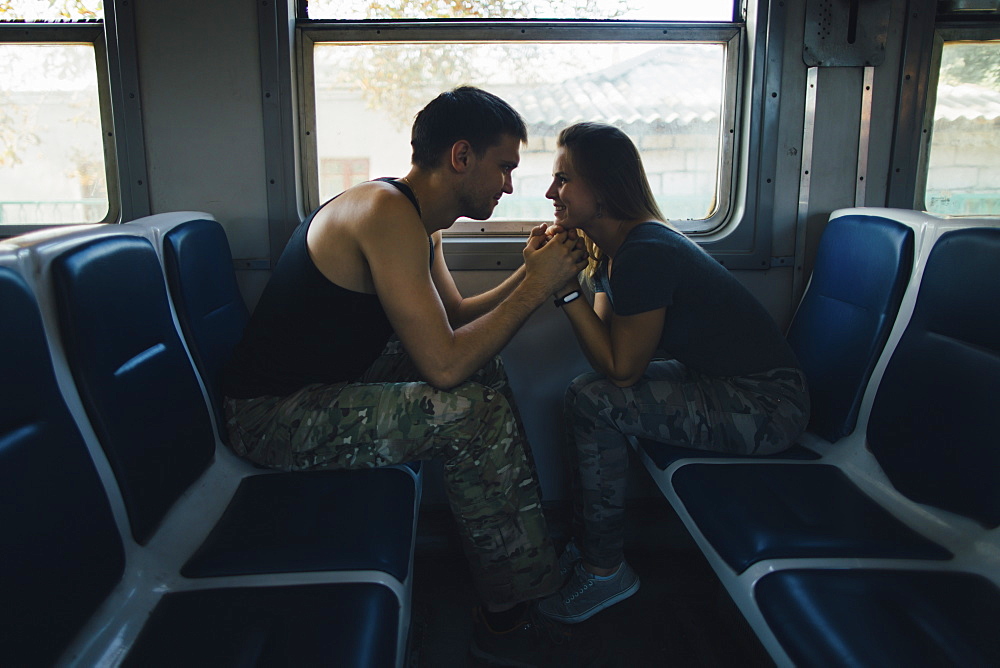 Romantic couple on train