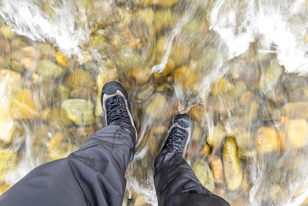 Man standing in river