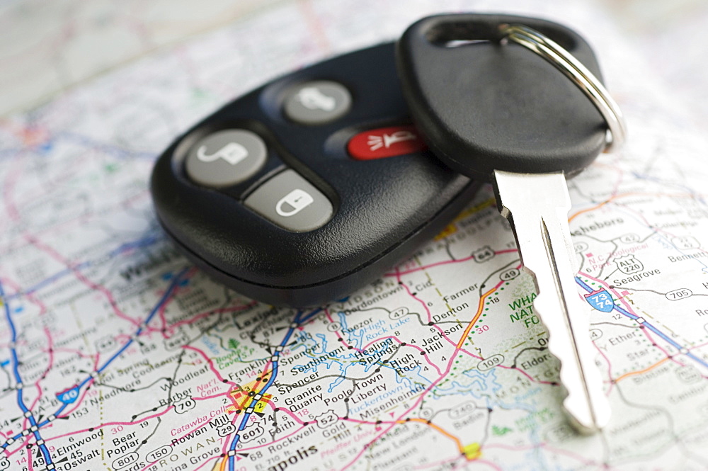 Closeup of car keys and map