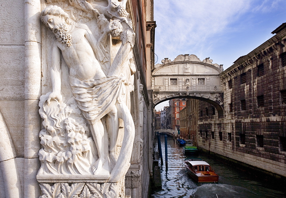 The Bridge of Sighs with sculpture depicting Drunkenness of Noah Doge's Palace Venice, Italy