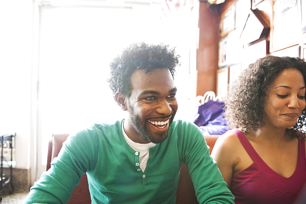 Smiling African American couple in diner