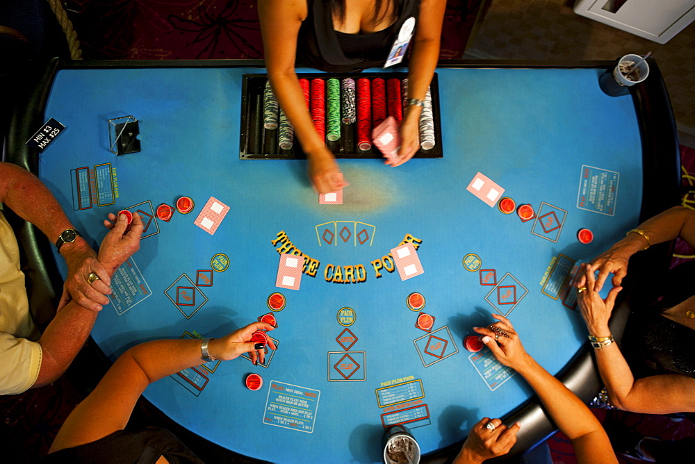 People playing poker in casino