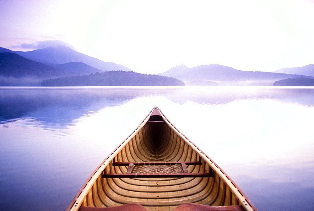 United States, New York, Lake Placid, View of Whiteface Mountain from wooden canoe on Lake Placid